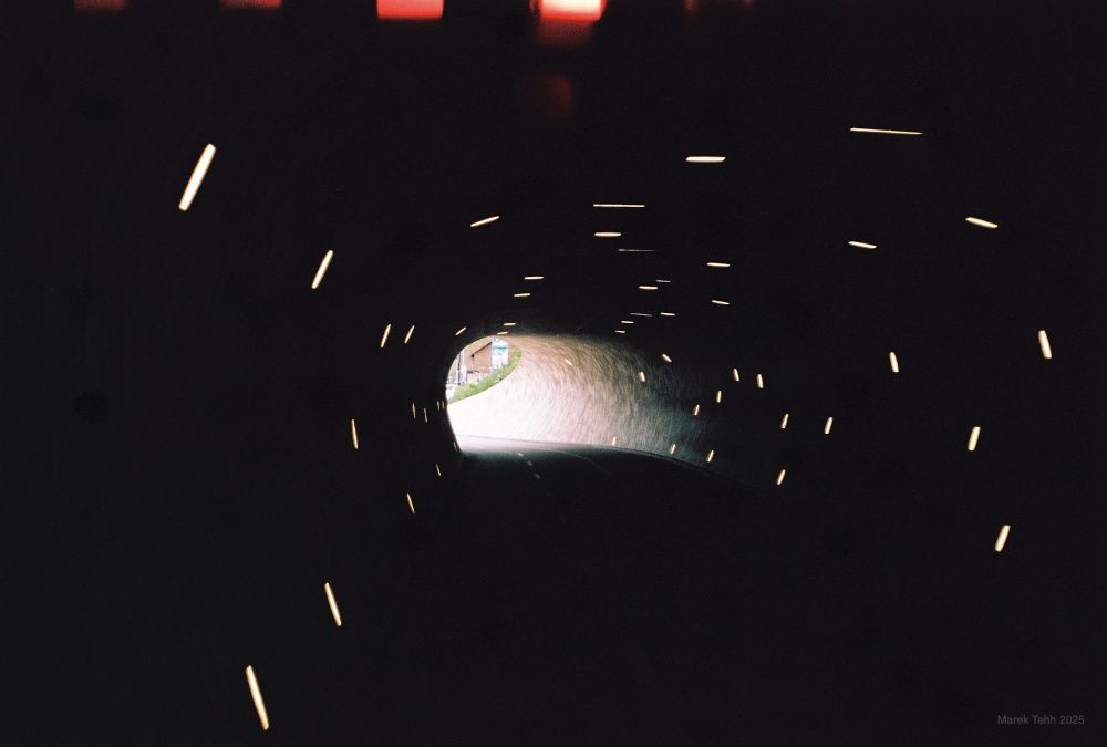 Dark tunnel with patterns of light